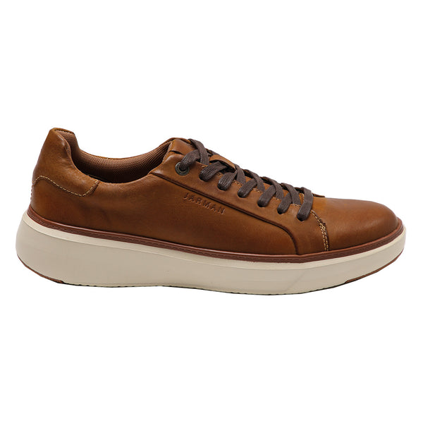 Zapatilla color cafe de cuero para hombre vista lateral